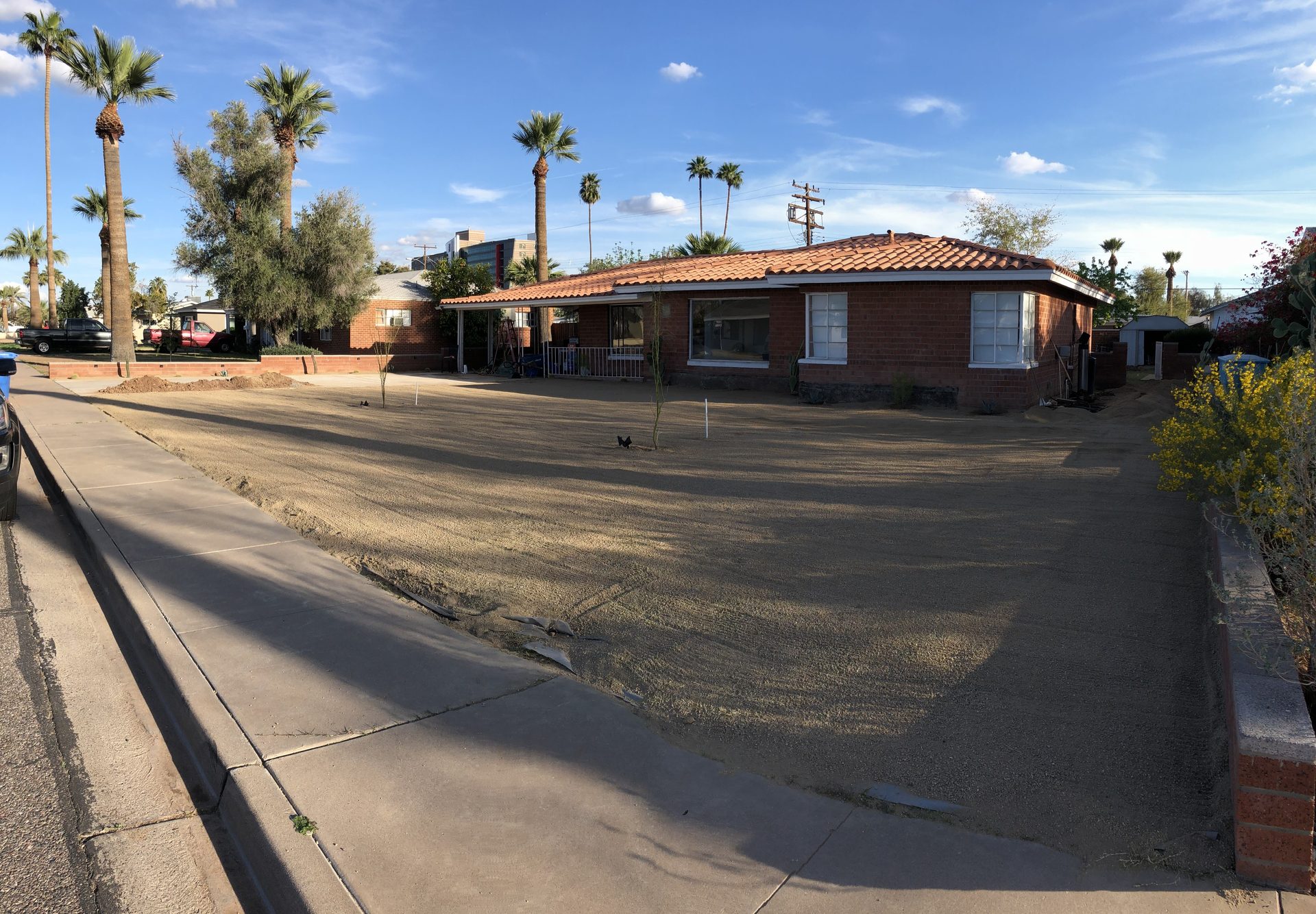 Graded and compacted decomposed granite front yard in Phoenix before planting