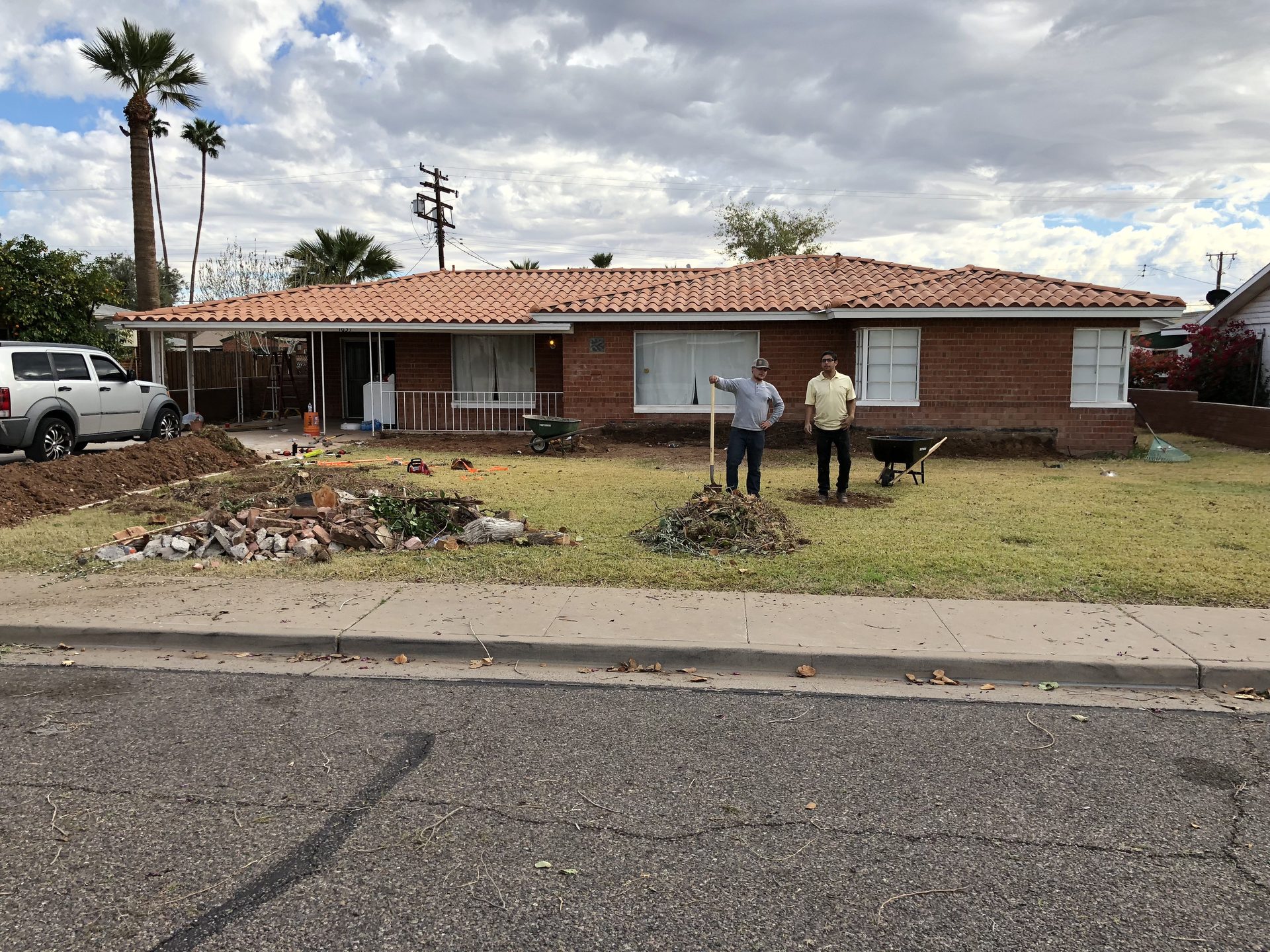 Harrison Norem on site during front yard demolition at a Phoenix home