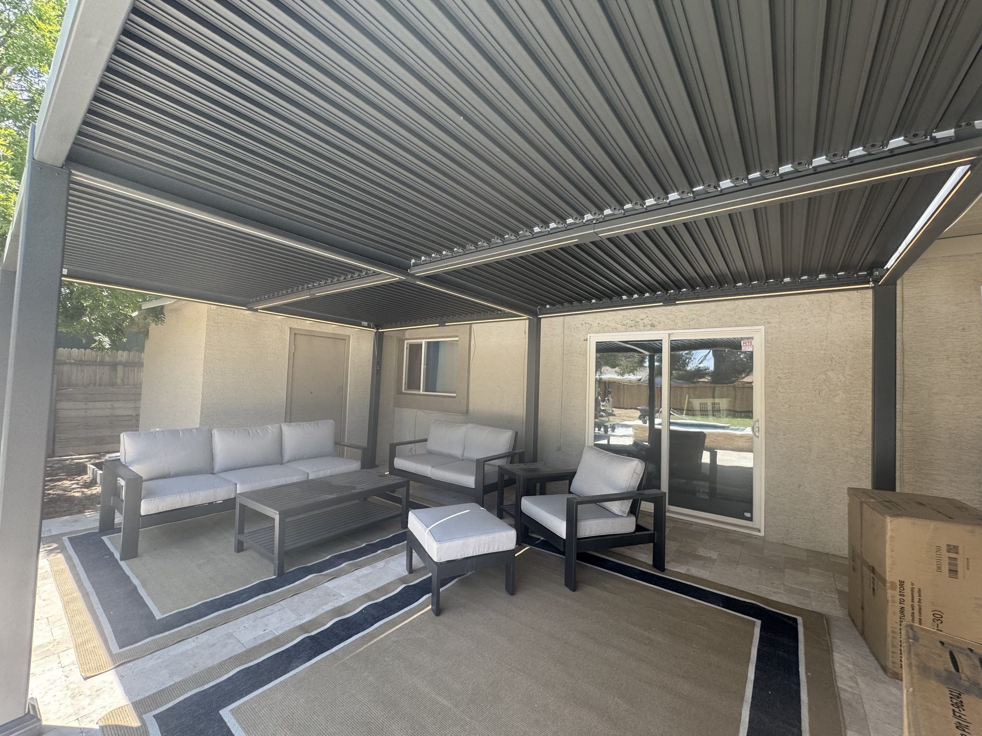 Under a louvered pergola on a Phoenix patio