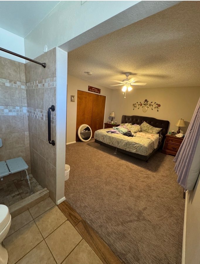 Finished wheelchair-accessible bathroom entry in a Mesa home