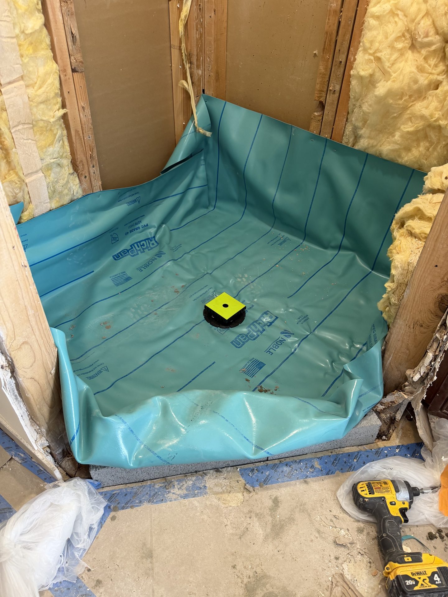 PVC shower pan liner turned up the walls and wrapped over the masonry curb before the top mortar bed, Scottsdale shower rebuild