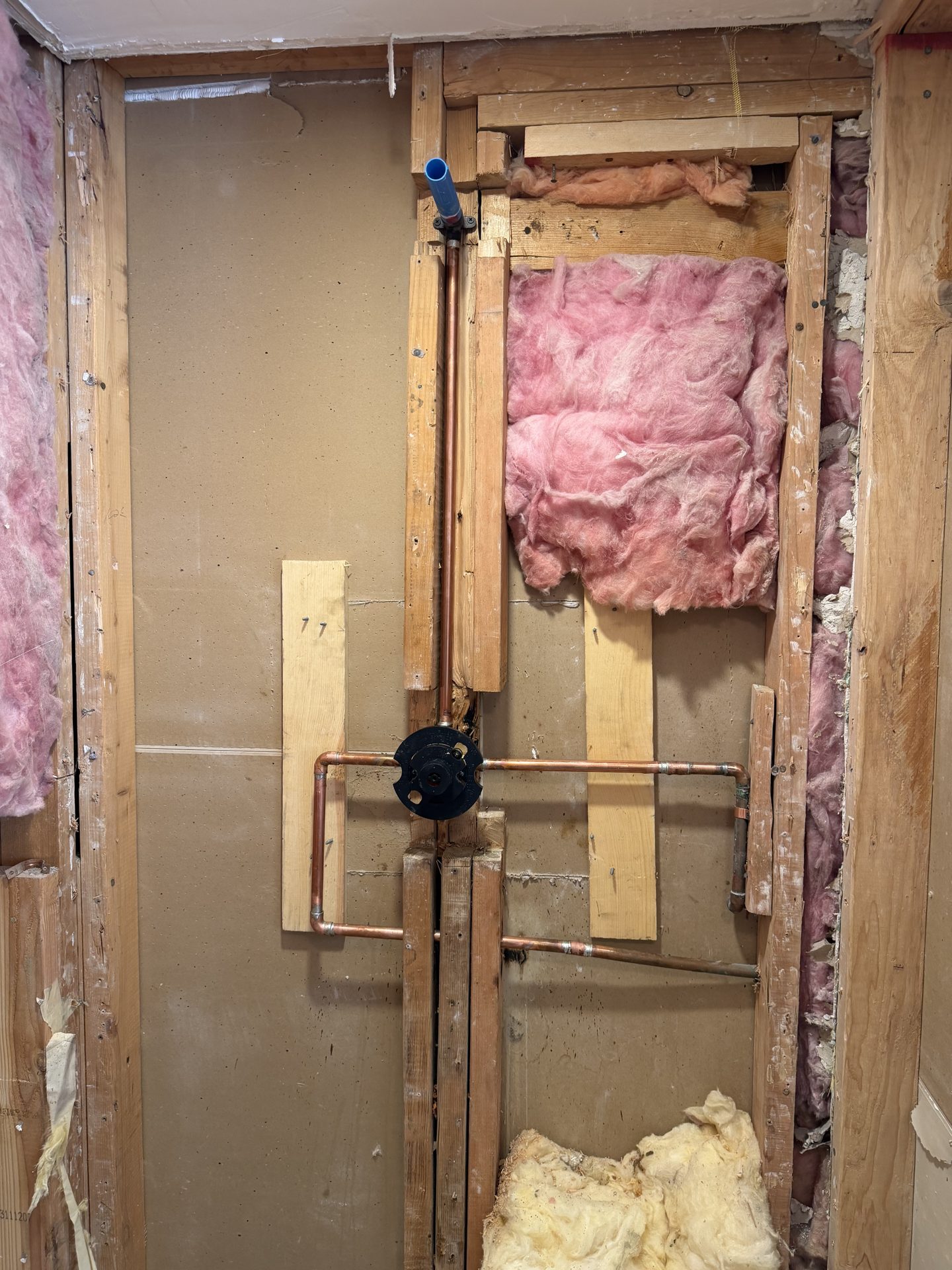 Shower mixing valve set on blocking with its plaster guard fitted and new copper supply lines run, Scottsdale shower rebuild